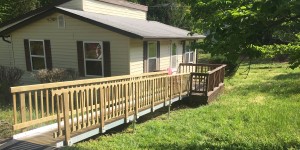 Wooden wheelchair ramp by Richmond Ramps